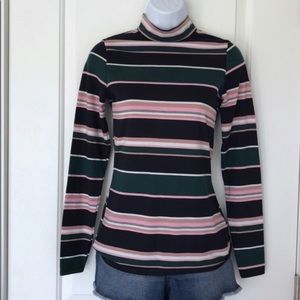 Mock turtleneck w/ green, pink, black & white stripes